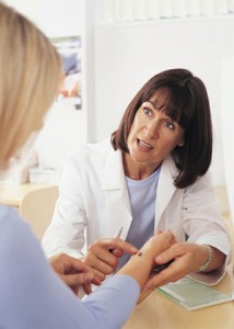Patient consulting a dermatologist